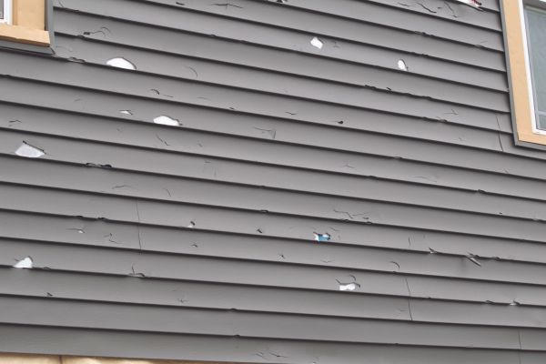 Damaged Siding Replacement in Humble