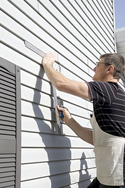 Cost of Vinyl Siding Service in Humble